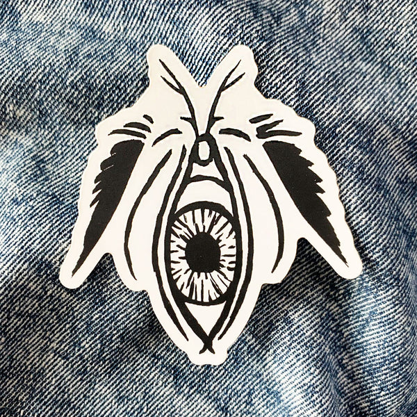 Moth eye sticker in black and white, split back sticker in matte finish. Waterproof and scratch resistant polypropylene. From Osseous Design by independent artist Makena Peet.