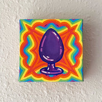 NSFW canvas panting of a purple adult toy with a rainbow background. Art from Osseous Design by independent artist Makena Peet.